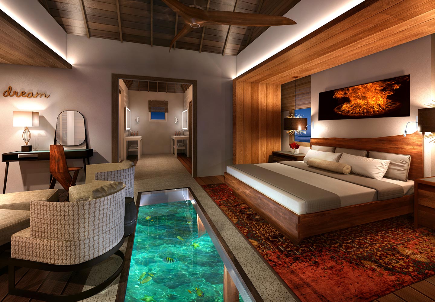 A suite interior with a glass-floor panel over a tropical fish lagoon