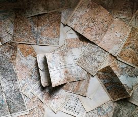 Europe A collection of vintage maps scattered for exploring world journeys and discoveries.